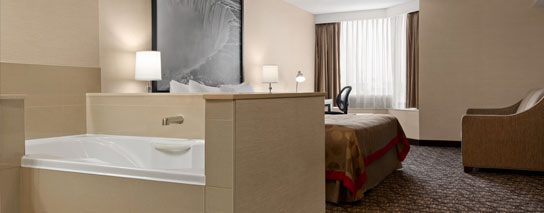 One king bed whirlpool suite room at Ramada by Wyndham Niagara Falls Near The Falls