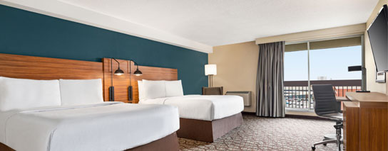 Two queen beds and balcony room with city view in Tower B
