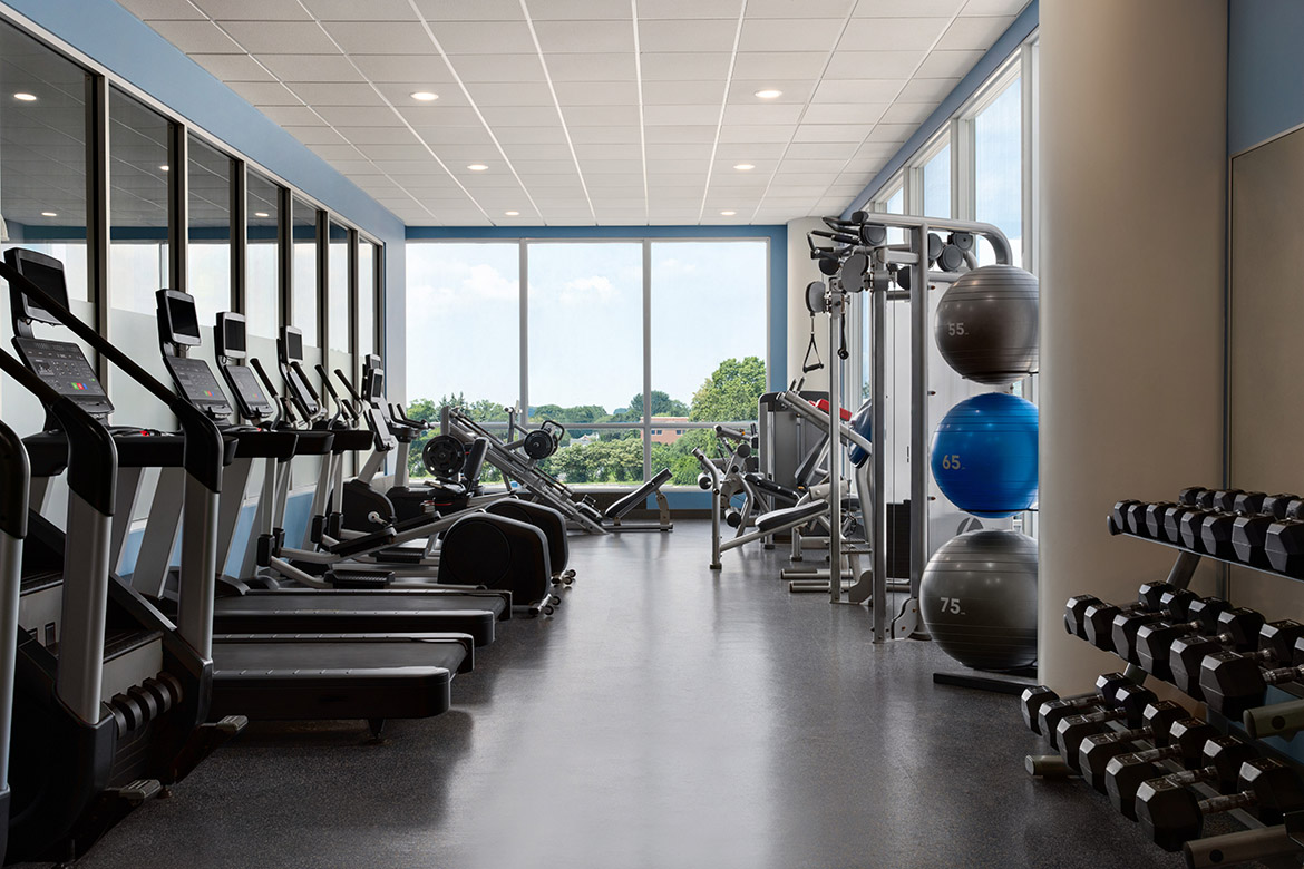 Fitness centre with treadmills, strength machines, and free weights